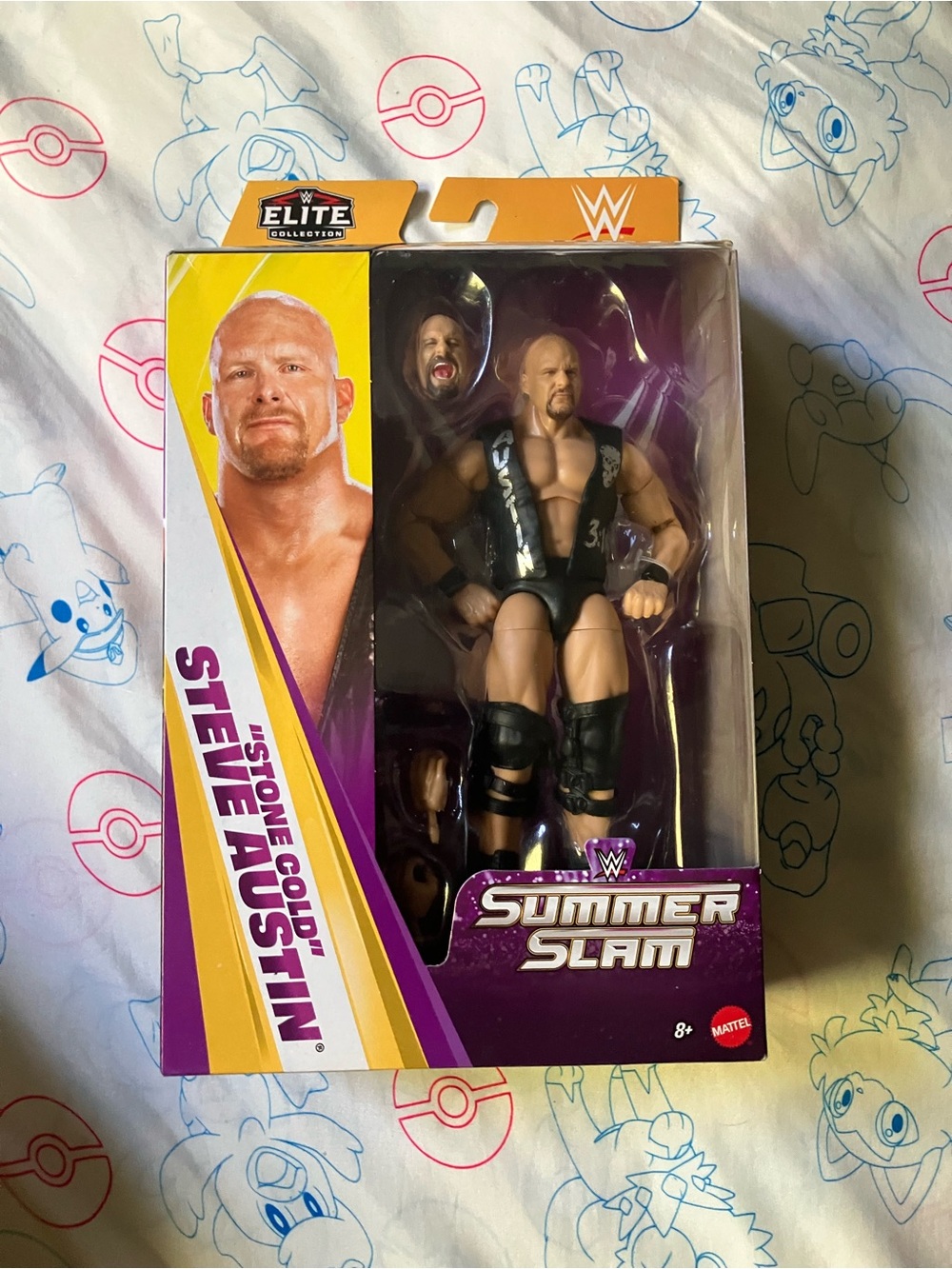WWE Steve Austin Action Figure – Black, Purple, Yellow Packaging